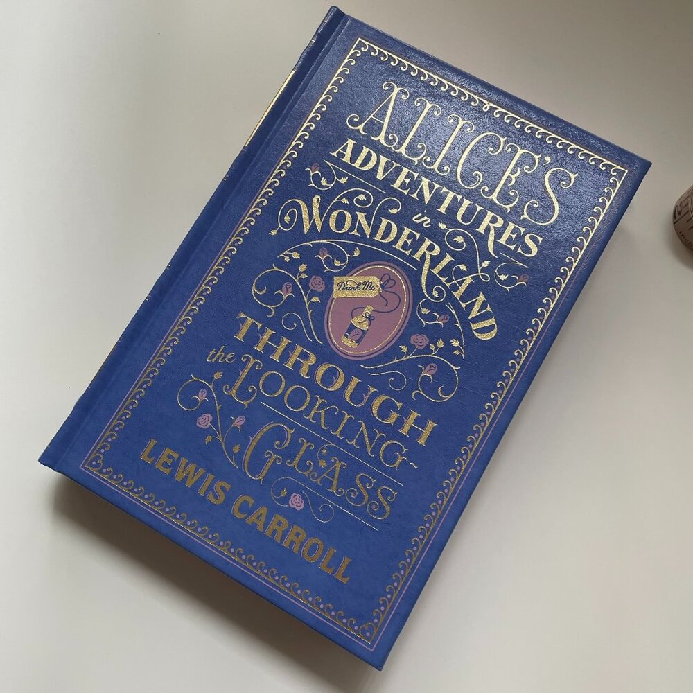 Alice's Adventures in Wonderland and Through the Looking-Glass by Lewis Carroll
